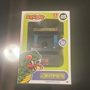 Arcade Classics Centipede hand held game.